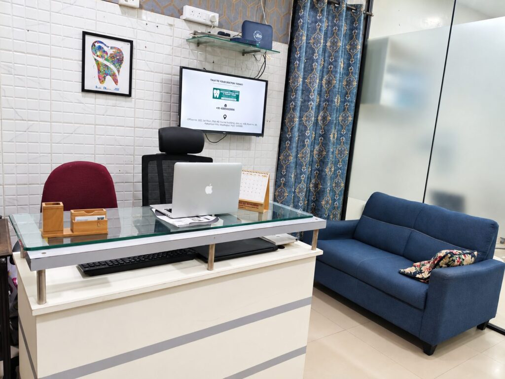 Reception and consultation desk at Yashodhar Dental Clinic