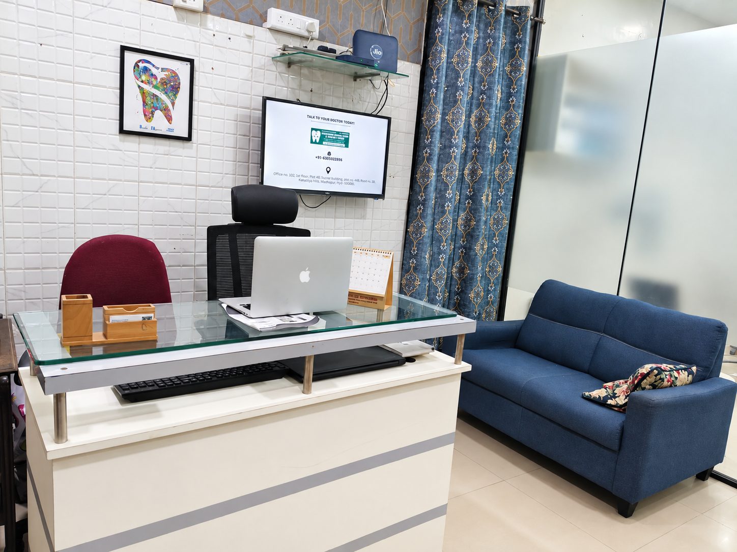 Reception and consultation desk at Yashodhar Dental Clinic