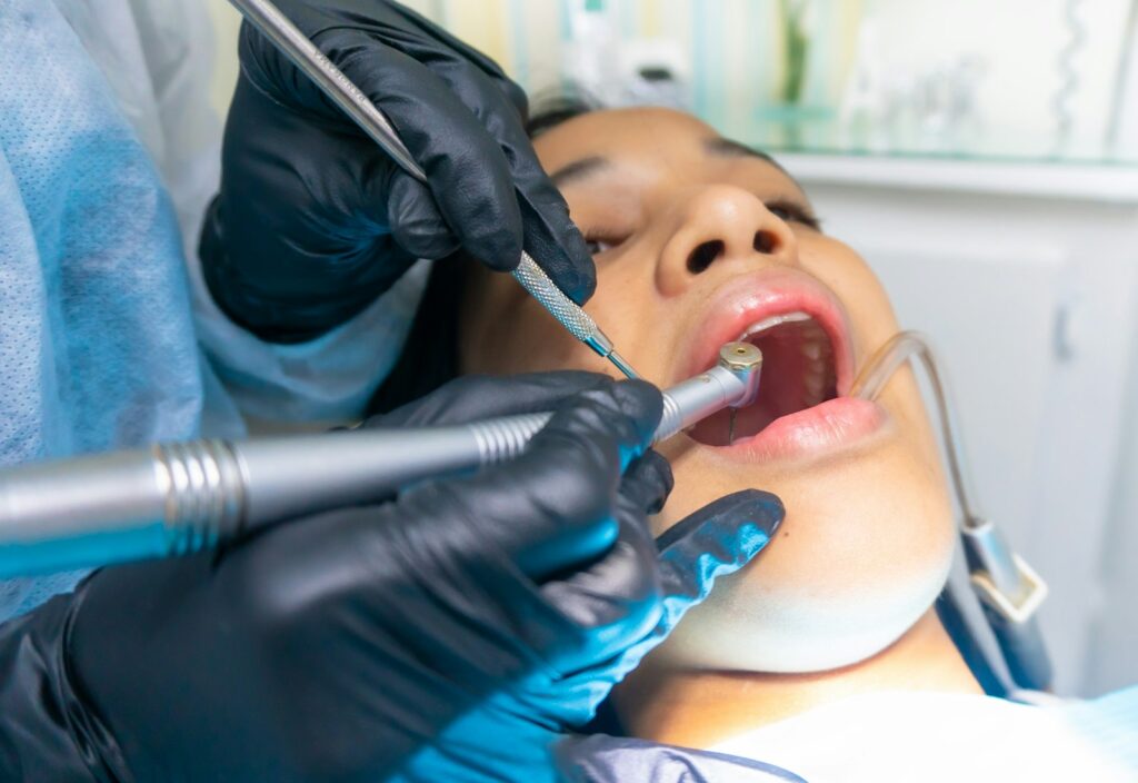 Dentist treating a patient